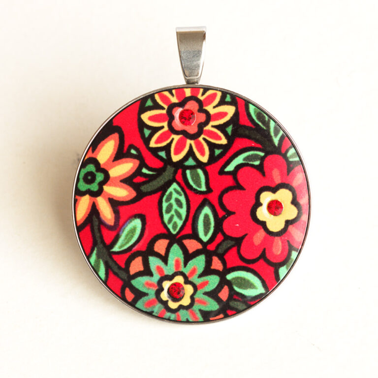 Nemesacél női medál, virág motívummal